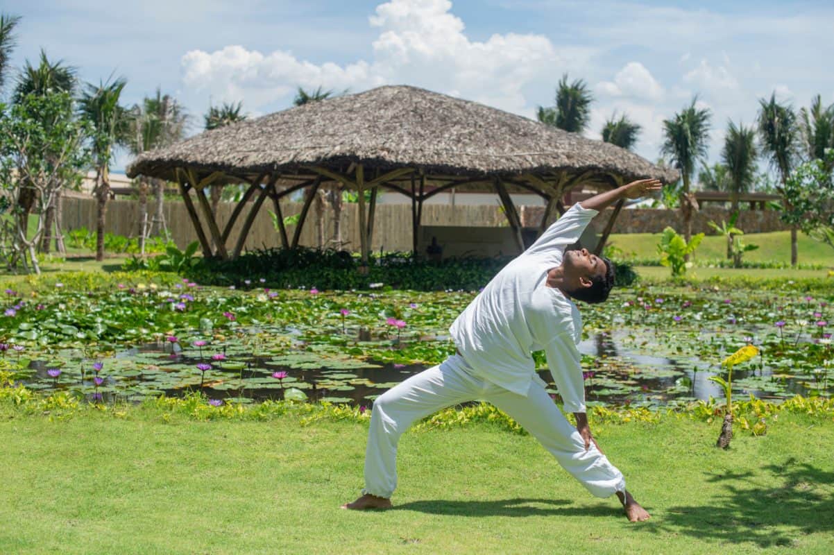 Practicing yoga with Fusion Resort Cam Ranh's resident yogi Vishnu